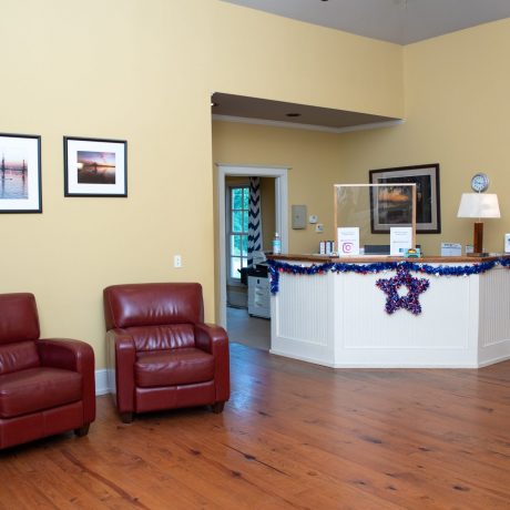 Reception desk next to lounge area