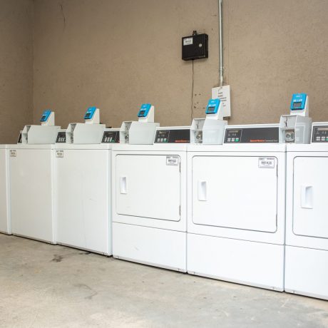 Washing machines and dryers in a laundry room