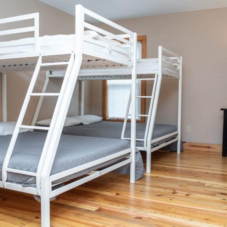 Two Bunkbeds in a bedroom