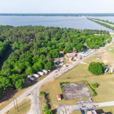 Aerial view of Palmetto Shores Resort with lake in the background