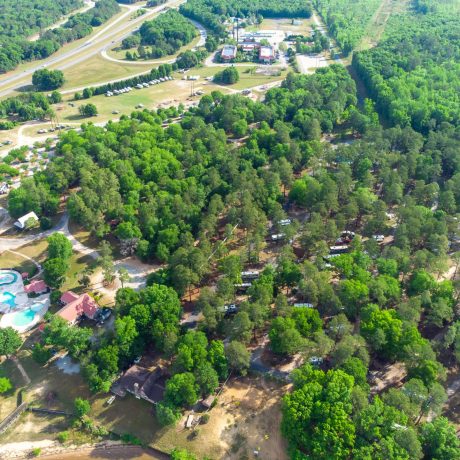 Aerial view of Palmetto Shores Resort with lots of trees