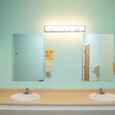 restroom lavatory area with two sinks