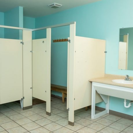 restroom area stalls and lavatory area